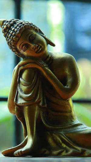 God Mobile Buddha Gold Figurine Wallpaper