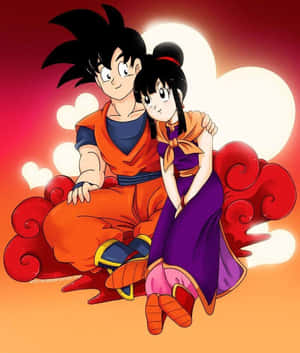 Goku And Chichi Sitting On Cloud Wallpaper