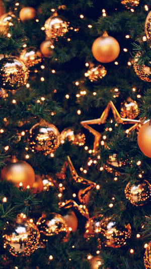 Gold Festive Christmas Tree Zoom Shot Portrait Wallpaper