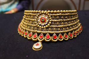 Gold Jewellery With Red Stones Wallpaper
