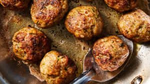 Golden Browned Meatballsin Pan Wallpaper