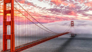 Golden Gate Bridge Orange Fluffy Clouds Wallpaper