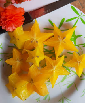 Golden Star Carambola On Plate Wallpaper