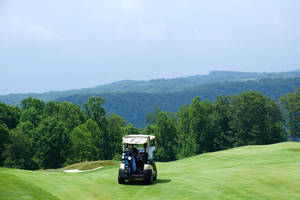 Golf Cart On Golf Course Wallpaper
