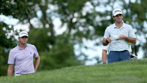 Golfers Analyzing Next Shot Wallpaper