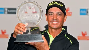 Golferwith Trophy Smile Wallpaper