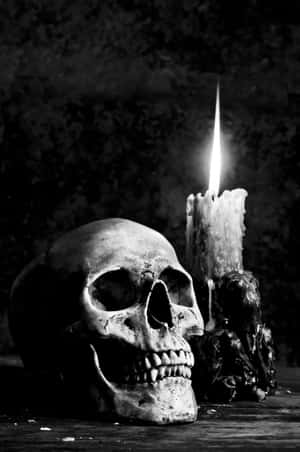 Gothic Aesthetic Skull And Candle Wallpaper