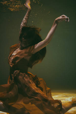 Graceful Woman Underwater Aesthetic Photography Wallpaper