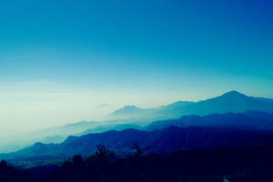 Gradient Blue Foggy Mountains
