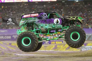 Grave Digger Monster Truck During Race Wallpaper