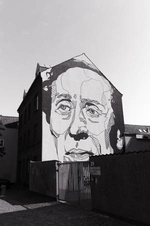 Grayscale Face Building Street Art Wallpaper