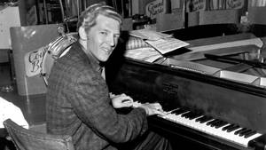 Grayscale Jerry Lee Lewis Playing Piano Wallpaper