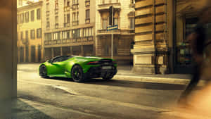 Green Car And Brown City Buildings Wallpaper