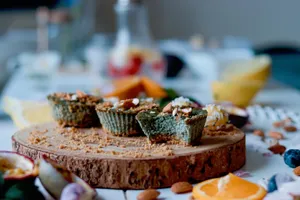 Green Cupcakes With Fruits Wallpaper