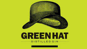 Green Hat Distilled Gin Logo On Wooden Background Wallpaper