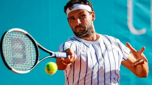 Grigor Dimitrov Hits Tennis Ball Wallpaper