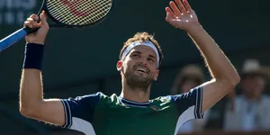 Grigor Dimitrov Raising Arms Up Wallpaper