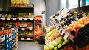 Grocery Store Variety Of Fruits Wallpaper