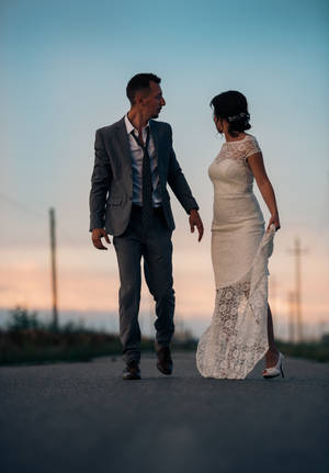 Groom And Bride In Road Wallpaper