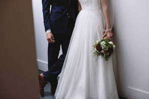 Groom And Bride In Wall Wallpaper