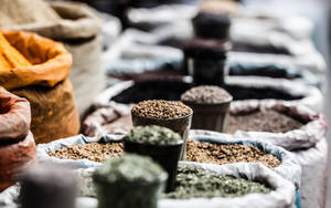 Ground Spices In Sacks Focused Shot Wallpaper