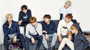 Group Bts On Couch Blue And White Wallpaper