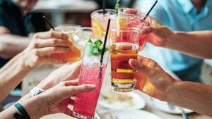 Group Celebration Clinking Of Alcohol Cocktail Wallpaper