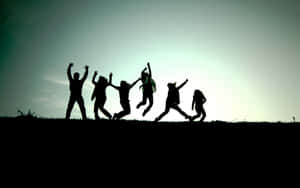 Group Of Friends Jump Shot Wallpaper