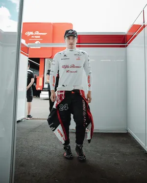 Guanyu Zhou Dressed In White Long Sleeves Wallpaper