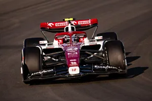 Guanyu Zhou Red And White Race Car Wallpaper