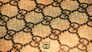 Gucci Pattern And Logo Wallpaper