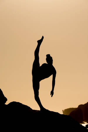 Gymnastics Leg Lift Silhouette Wallpaper