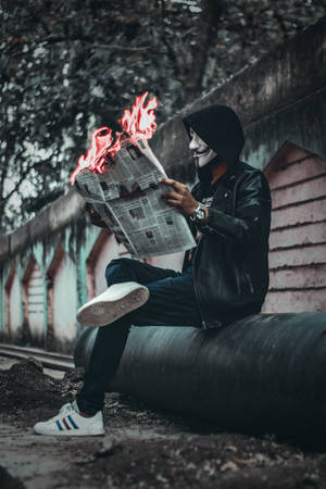 Hacker Mask Man With Newspaper Wallpaper