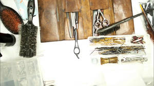 Haircut Tools In Leather Bag Wallpaper