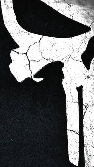Half Punisher Skull On Concrete Wallpaper
