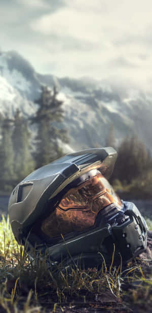 Halo Master Chief Helmet On The Ground Wallpaper