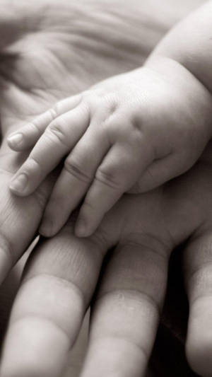 Hand In Hand Baby With Mother Wallpaper