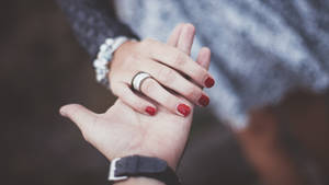 Hand In Hand With Diamond Ring Wallpaper