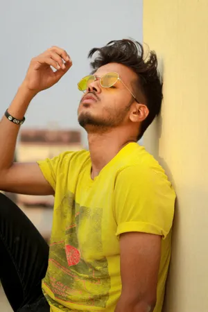 Handsome Boy Doing Chin-up Pose Wallpaper