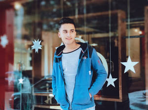 Handsome Boy Wearing Blue Jacket Wallpaper