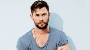 Handsome Portrait Of Chris Hemsworth Wallpaper