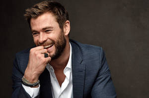 Happy Chris Hemsworth Wallpaper