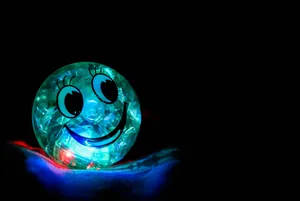Happy Glowing Ball Wallpaper