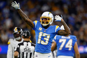 Happy Keenan Allen Hands Raised Wallpaper