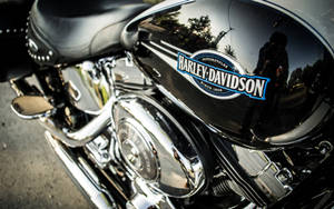 Harley Davidson Logo On Black Motorbike Wallpaper
