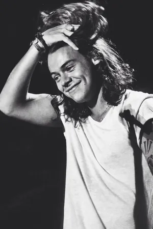 Harry Styles Looking Suave In Classic Black And White. Wallpaper