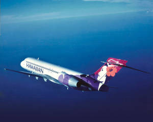 Hawaiian Airlines Plane Above The Ocean Wallpaper