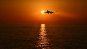 Hd Plane Flying Into Sunset Wallpaper