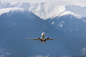 Hd Plane Flying Snowy Mountains Wallpaper