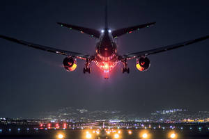 Hd Plane Landing At Night Wallpaper